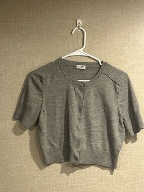 Akris Punto crop top, designer net, soft wool blend, minimalist, luxury.